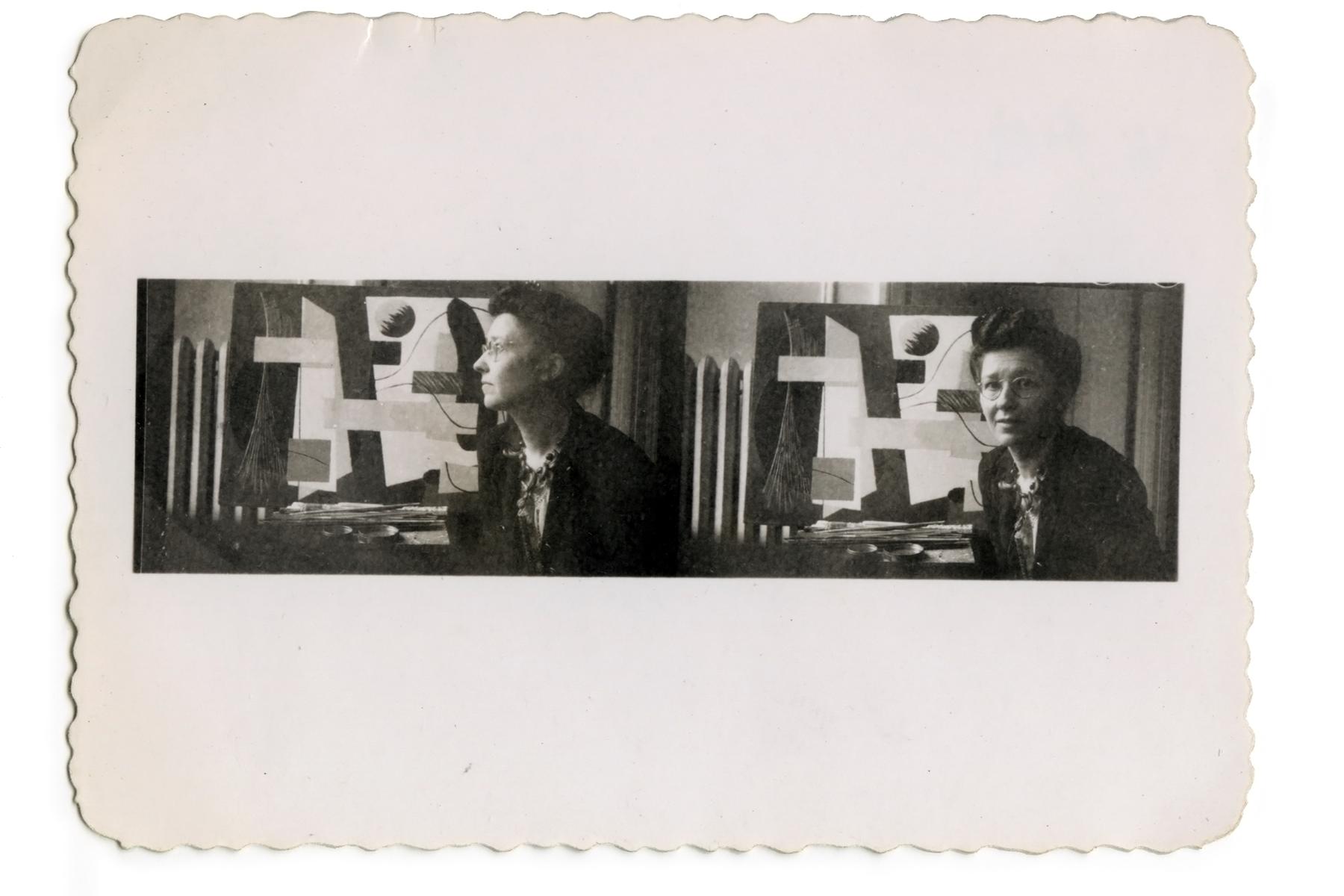 Two small black-and-white images from the mid- 1940s next to each other of a light-skinned woman with glasses in front of an abstract painting. In the first, her profile is in view, and in the second, she is looking directly at the camera.